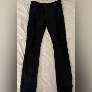 Express. Size 6. Black mid-rise jegging. Distressed